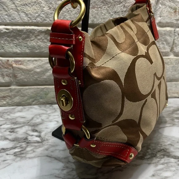 Coach Carly Signature Hobo Bag with red leather trim and gold-tone hardware. - Picture 5 of 14